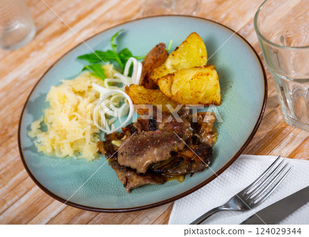 Appetizing fried rabbit liver with vegetables Appetizing fried rabbit liver with vegetables 124029344