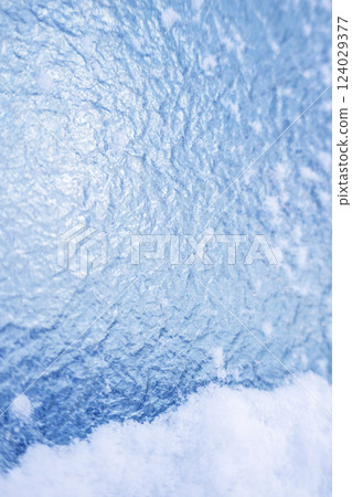 Uneven blue glass creates a cool image Uneven blue glass creates a cool image 124029377