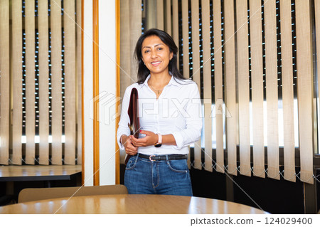 Portrait of successful latino american business woman Portrait of successful latino american business woman 124029400