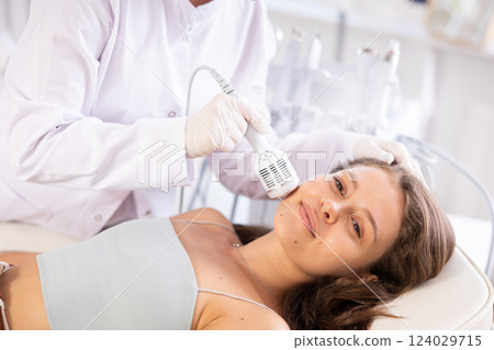 Facial procedure to European girl (ice hummer) Facial procedure to European girl (ice hummer) 124029715