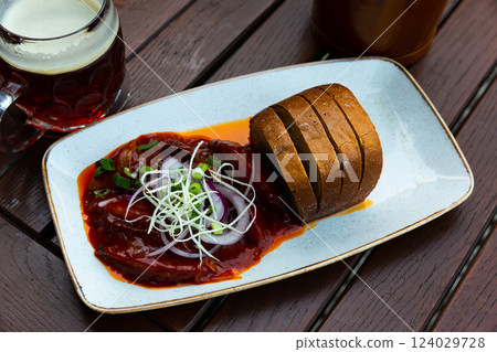 Baked sausages on beer Baked sausages on beer 124029728