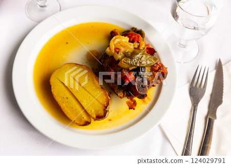 Popular Italian dish Ternasco Al Forn, prepared with delicious young lamb meat 124029791