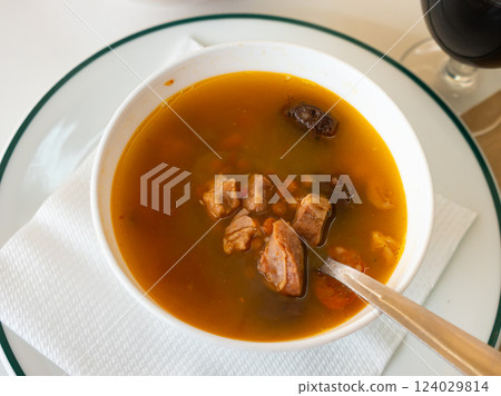 Stewed lentils with sausages, spanish Riojan lentils 124029814