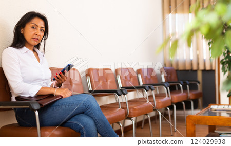 Latino american woman waiting for job interview 124029938
