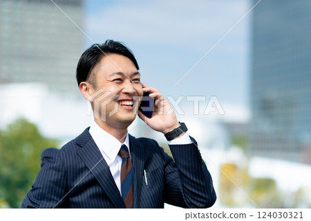 Businessman to talk to Businessman to talk to 124030321