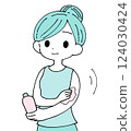 Woman applying body lotion 124030424