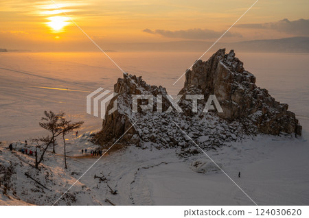 The Shaman rock one of sacred place frozen lake Baikal in winter season of Siberia, Russia. This rock is a subject of many popular legends and myths about Baikal Lake and Angara river. 124030620