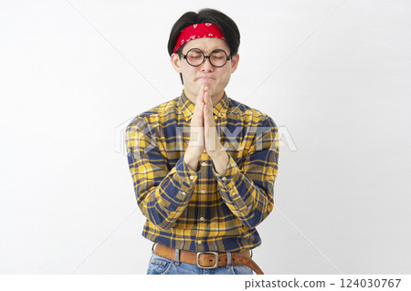 Akihabara-style men praying together on a white background 124030767