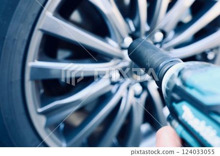 Changing tires with an impact wrench Changing tires with an impact wrench 124033055