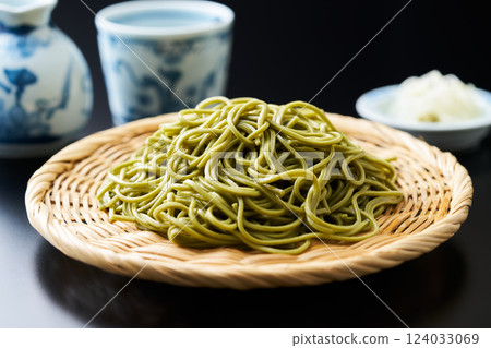 Green tea soba noodles served on a bamboo sieve Green tea soba noodles served on a bamboo sieve 124033069