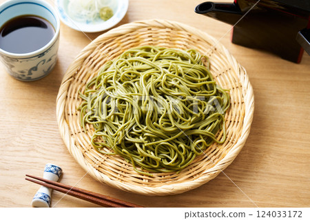 Green tea soba noodles served on a bamboo sieve Green tea soba noodles served on a bamboo sieve 124033172