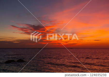 Beautiful Pink Clouds Sunset from the Sea Beautiful Pink Clouds Sunset from the Sea 124035230