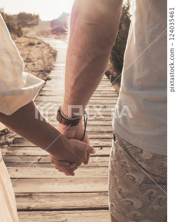 Hand in hand, together on the road of life 124035461