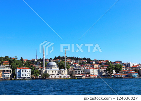 View from Bosphorus to old houses and mosque, Turkey, Istanbul. Golden Horn bay and summer cityscape at sunny day, Istanbul. Topic of vacation, travel, trip abroad on vacation, cruises and tours View from Bosphorus to old houses and mosque, Turkey, Istanbul. Golden Horn bay and summer cityscape at sunny day, Istanbul. Topic of vacation, travel, trip abroad on vacation, cruises and tours 124036027