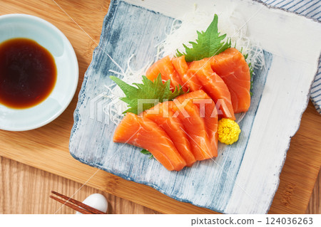 Fresh salmon sashimi on a plate 124036263