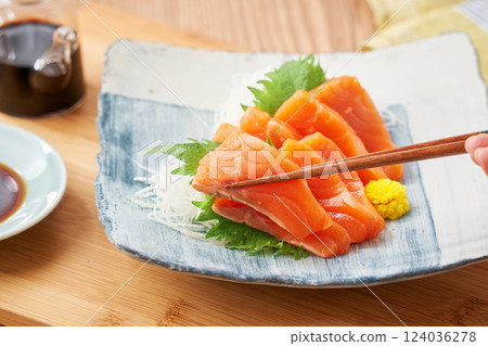 Fresh salmon sashimi on a plate Fresh salmon sashimi on a plate 124036278