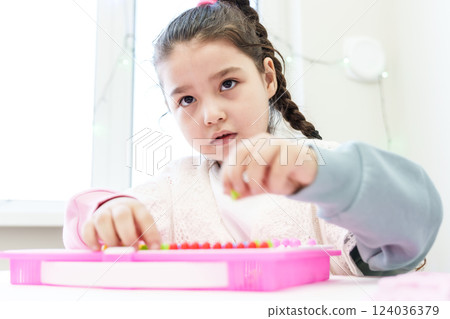 girl plays educational games, girl plays educational games, 124036379