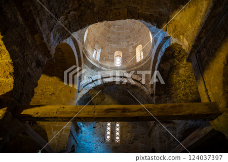 The interior of an old chapel inside the fortress of Kyrenia in Northern Cyprus. Ancient stone walls and sacred architecture reflect the historical and spiritual heritage of the site 124037397