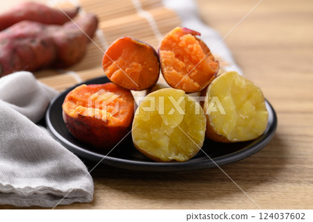 Orange and yellow sweet potato on plate ready to eating, Healthy food 124037602