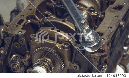 Transport maintenance wrench detail.Close-up using wrench to repair a car engine.Concepts of car care fix repair service and insurance.Close up of car technician repairs auto engine.Car repair service Transport maintenance wrench detail.Close-up using wrench to repair a car engine.Concepts of car care fix repair service and insurance.Close up of car technician repairs auto engine.Car repair service 124037690