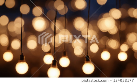 blurred lights of festive garland at night. festive lamp background 124038177