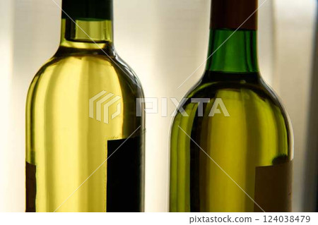 Two wine bottles side by side Two wine bottles side by side 124038479
