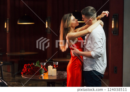 Closeness of the people. Romantic couple have dinner in the restaurant 124038511