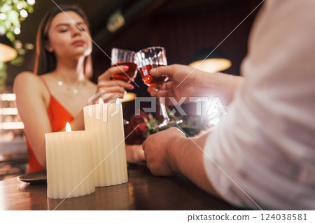 Cute romantic couple have dinner in the restaurant 124038581