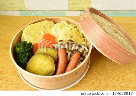 Steamed vegetables in a bamboo steamer Steamed vegetables in a bamboo steamer 124038918