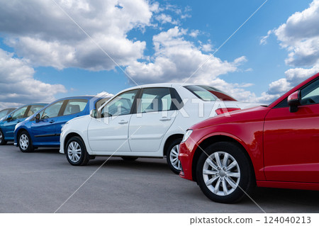 A lot of cars in a rows. Used car sales 124040213