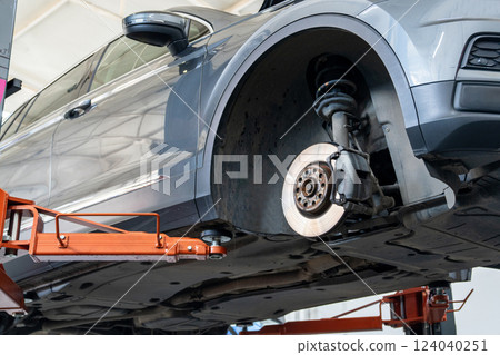 Car service workshop with cars on a column lifts Car service workshop with cars on a column lifts 124040251