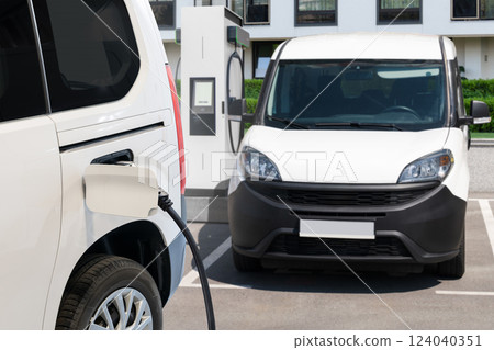 Electric delivery van with electric vehicles charging station Electric delivery van with electric vehicles charging station 124040351