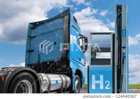 A hydrogen fuel cell semi truck with H2 gas cylinder onboard next to filling station. Eco-friendly commercial vehicle concept. 124040367