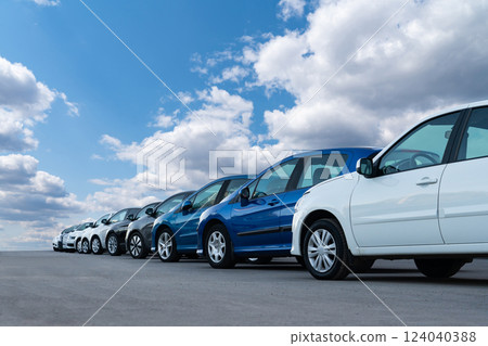 A lot of cars in a rows. Used car sales 124040388