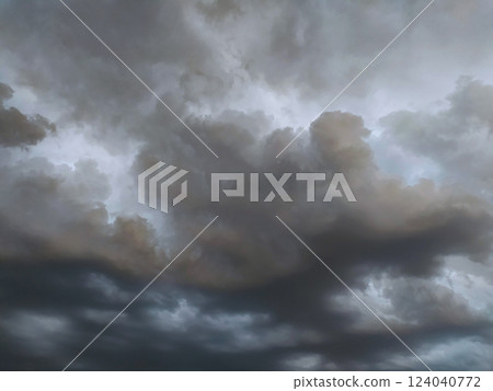 Dramatic, moody cloudscape. Perfect for backgrounds, weather reports, or atmospheric mood pieces. Intense grey and dark tones create Dramatic, moody cloudscape. Perfect for backgrounds, weather reports, or atmospheric mood pieces. Intense grey and dark tones create 124040772