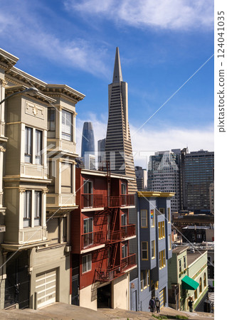 Steep street view with downtown skyline in San Francisco, USA 124041035