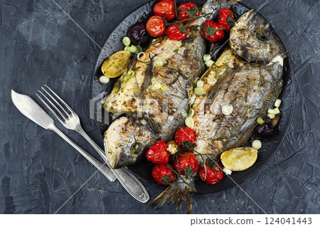 Baked dorado fish, seafood. Baked dorado fish, seafood. 124041443