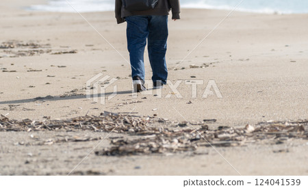 Walking on a sandy beach Walking on a sandy beach 124041539
