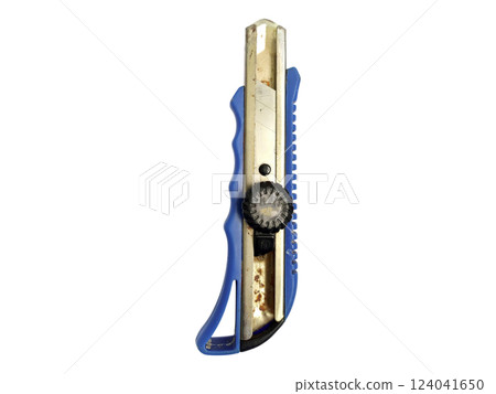 Closeup of a wellused box cutter with a blue handle against a white background.  Shows signs of wear, suggesting hard work and resilience. 124041650