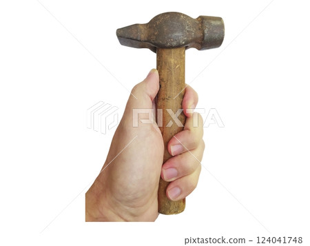 Closeup of a hand firmly gripping a weathered claw hammer.  The image evokes themes of craftsmanship, hard work, and construction. 124041748