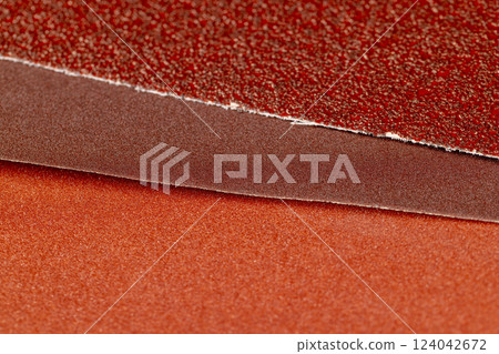 several different sheets of sandpaper for metal or wood processing 124042672