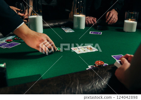 People playing poker on a evening party, entertainment 124042898