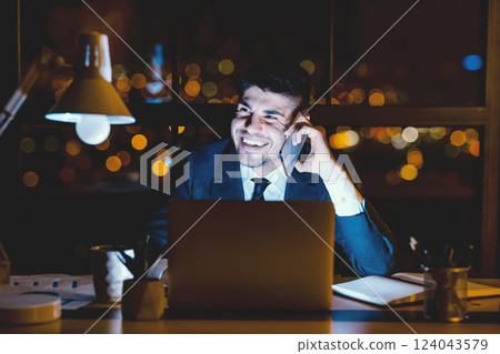 Business Call. Joyful Businessman Having Phone Conversation On Cellphone Sitting Overnight At Workplace In Modern Office. 124043579