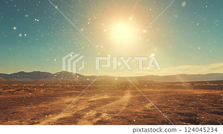 The sun shines brightly over a brown desert, casting a golden glow over the landscape. Dust particles float in the air. Distant mountains are visible on the horizon. The sun shines brightly over a brown desert, casting a golden glow over the landscape. Dust particles float in the air. Distant mountains are visible on the horizon. 124045234