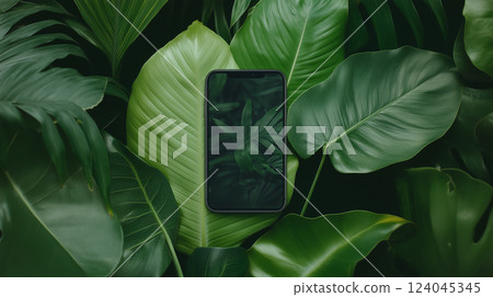 Mockup for business, phone on green background with plants, advertising 124045345
