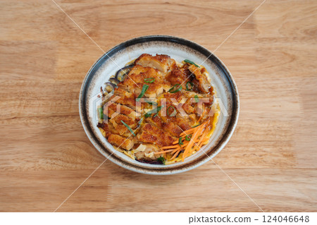 panko fried chicken with egg and vegetables. Delicious freshly prepared meal, perfect for menus, restaurants, or food delivery concepts. panko fried chicken with egg and vegetables. Delicious freshly prepared meal, perfect for menus, restaurants, or food delivery concepts. 124046648