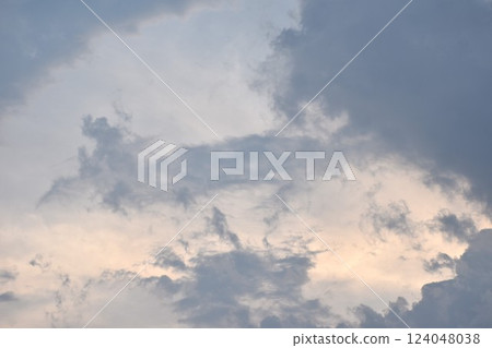 white and dark rain cloud floating on sky in evening white and dark rain cloud floating on sky in evening 124048038