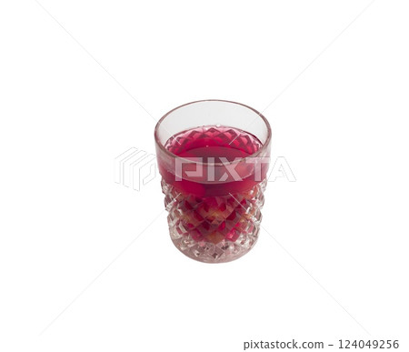 Sweet refreshing berry compote from ripe cherries in a glass isolated on white background. Sweet refreshing berry compote from ripe cherries in a glass isolated on white background. 124049256