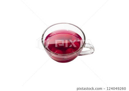 Sweet refreshing berry compote from ripe cherries in a glass isolated on white background. Sweet refreshing berry compote from ripe cherries in a glass isolated on white background. 124049260