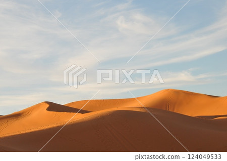 Morocco, Sahara Desert, Merzouga, Merzouga sand dunes in the morning sun Morocco, Sahara Desert, Merzouga, Merzouga sand dunes in the morning sun 124049533
